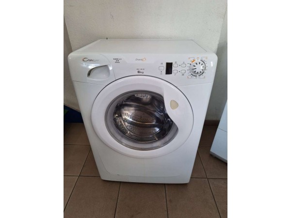 Használt Candy GO4 106 DF keskeny elöltöltős mosógép [H14505] 
