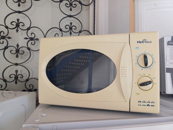 Használt Nethaus NH-6100 mikrohullámú sütő [H16747] 