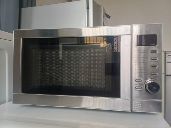 Használt Tesco MG208 Mikrohullámú Sütő [H17522] 